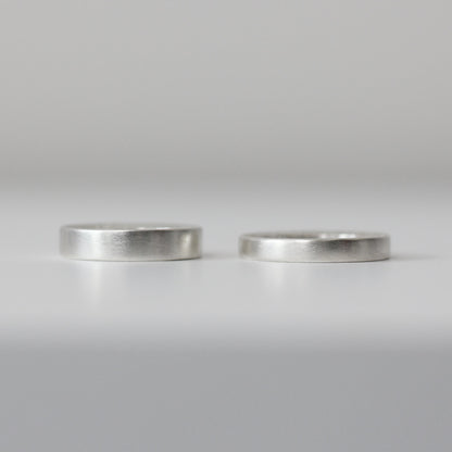 Sunshine Hammered Texture Band - Silver Hammered, 5mm and 4mm wide, alternative angle - Aisling Chou Studio